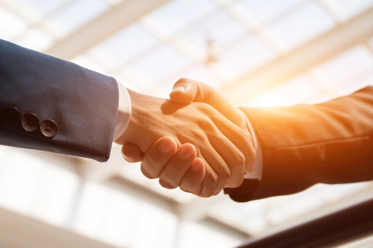 closeup shot of two people handshaking