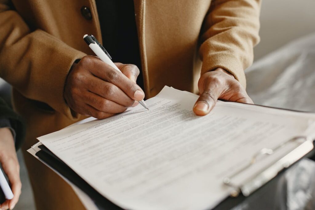 a private process server signing a document