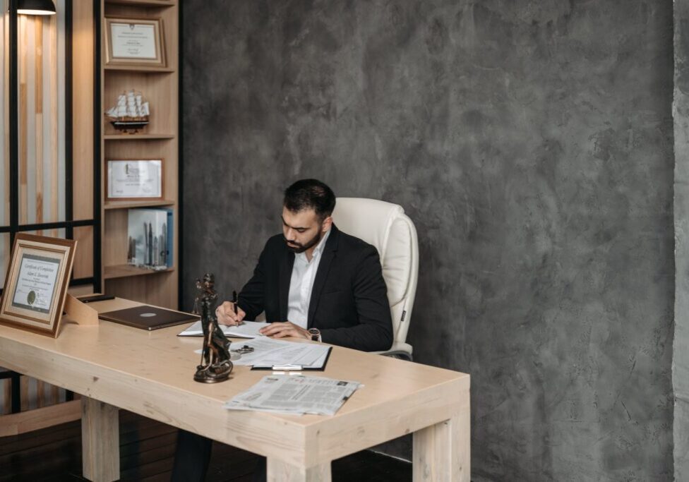 a private process server working in their office